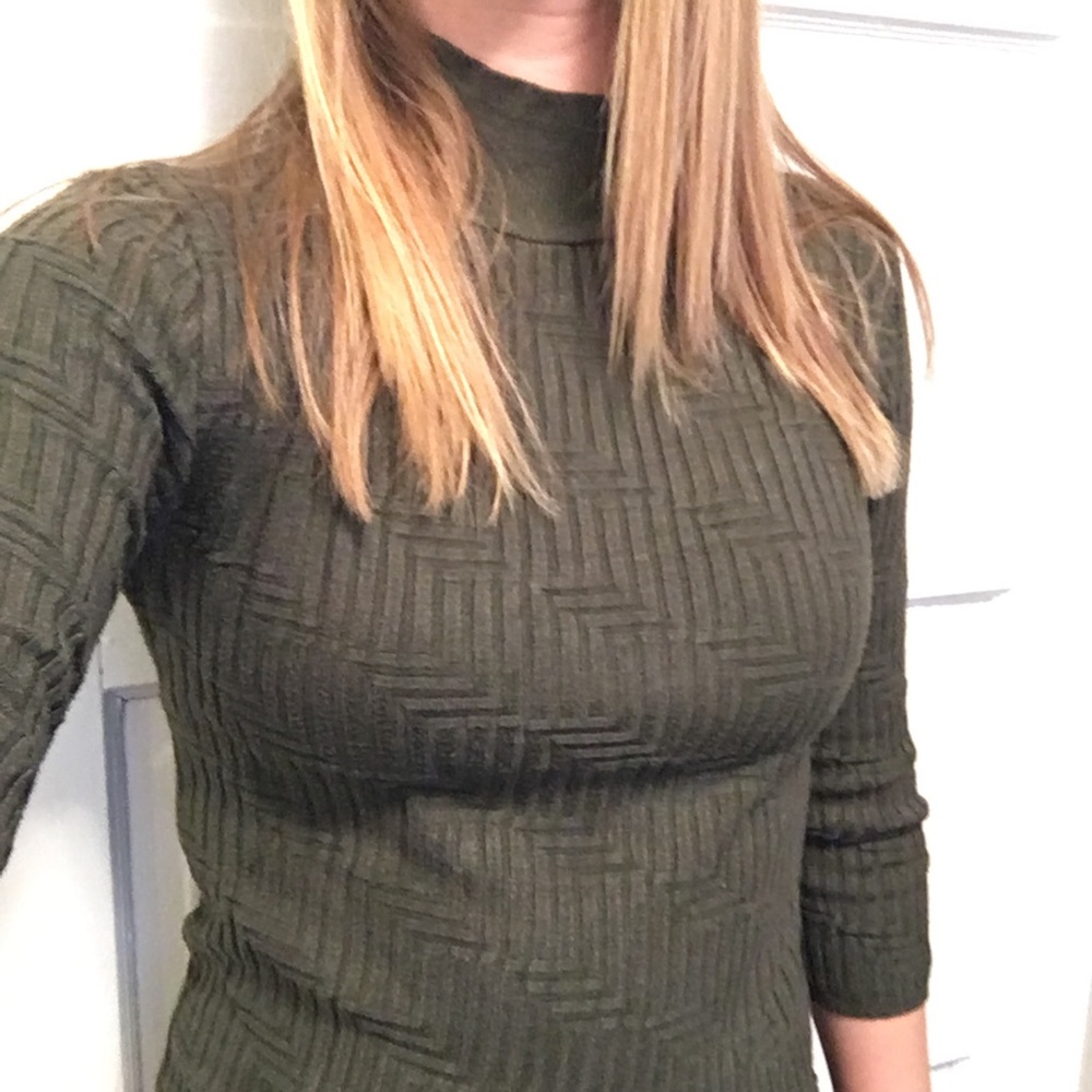 Green turtleneck sweater